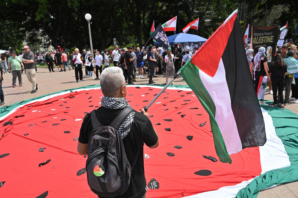 Pro-Palestinian rally in Sydney (Photo: AAP/Mick Tsikas / REUTERS) מחאות פרו-פלסטיניות בסידני, אוסטרליה