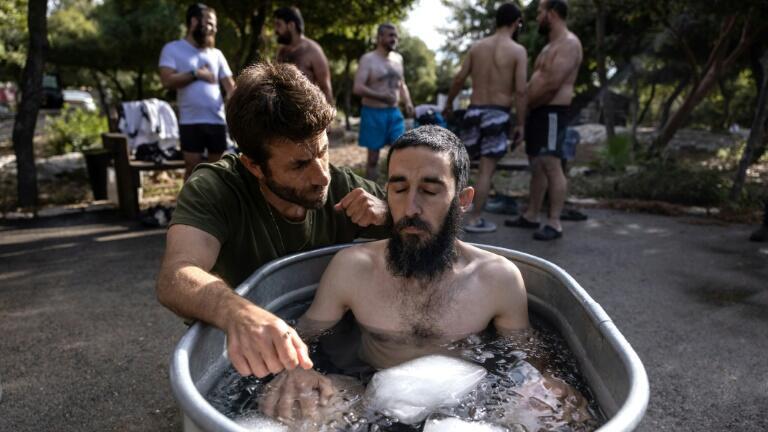The volunteer Israeli rescue workers, whose role is to collect the remains of the dead, have begun attending group healing sessions 