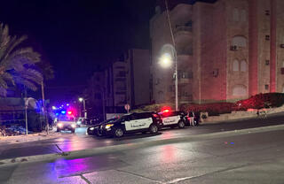 Jordanian security forces outside the Israeli embassy in Amman 