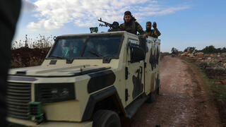 לוחמים בארגון המורדים הג'יהאדיסטי הייאת תחריר א שאם חלב סוריה