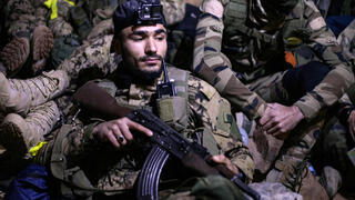 לוחמים בארגון המורדים הג'יהאדיסטי הייאת תחריר א שאם חלב סוריה