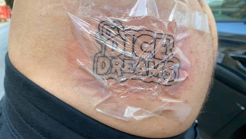 D.'s backside tattoos now worth $1.2 million (-) D.'s backside tattoos now worth $1.2 million