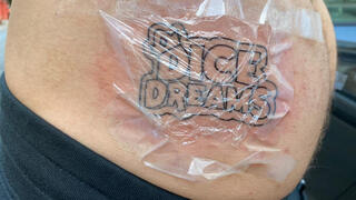 D.'s backside tattoos now worth $1.2 million