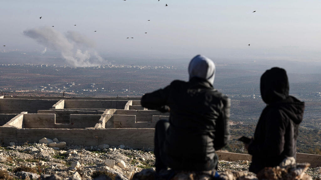 Syria during the battles between the rebels and Assad's army (Photo: Omar Haj Kadour/ AFP) קרבות בין מורדים לצבא סוריה חלב
