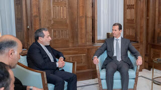 President Bashar al-Assad meets with Iran's Foreign Minister Abbas Araghchi 