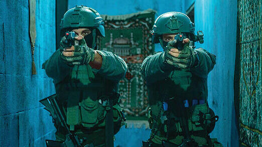 מילואימניקים באימון בשטח בנוי כפי שצילם המתעד הצבאי דויד ריבייב שנפצע בעזה