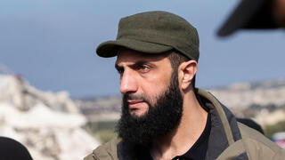 אבו מוחמד אל ג'ולני מנהיג הייאת תחריר א שאם סוריה מורדים נגד משטר אסד נפל דמשק