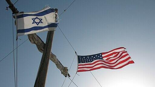 American and Israeli flags on mast