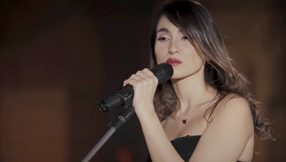איראן פרסטו אחמדי זמרת בת 27 הופיעה בלי חיג'אב נעצרה