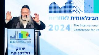 קריאות כנגד השר יצחק גולדקנופף במהלך נאומו 