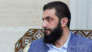 אבו מוחמד אל-ג'ולאני מנהיג המורדים במפגש עם שליח האו"ם גיר פדרסן ב דמשק סוריה