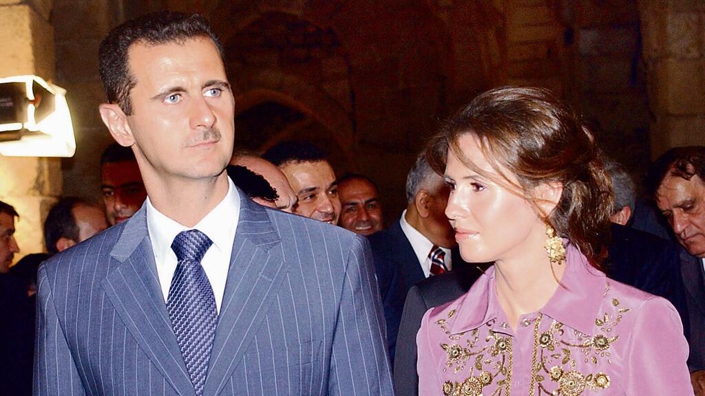 Башар Асад и его супруга (Фото: Bassem Tellawi, AP) בשאר ואסמא אל-אסד