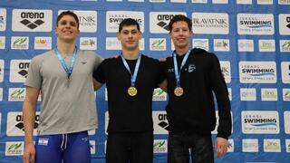 קריצ'בסקי על הפודיום עם איתן בן שטרית ויואב רומנו