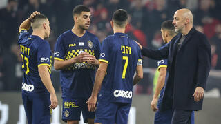 ז'רקו לאזטיץ' ושחקני מכבי ת"א