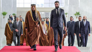 השליט החדש של סוריה אבו מוחמד אל ג'ולאני עם ראש ממשלת קטאר