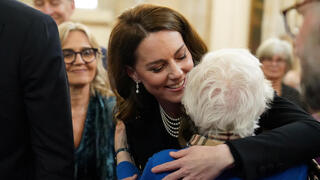  Catherine, Princess of Wales, embraces Yvonne Bernstein as she attends a ceremony to commemorate Holocaust Memorial Day 