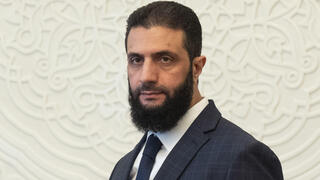 אבו מוחמד אל-ג'ולאני נשיא סוריה הזמני