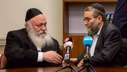 משה גפני (מימין) ויצחק גולדקנופף