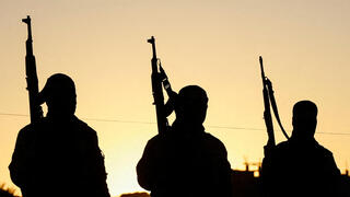 מחבלי חמאס באיזור שחרור החטופים בעזה