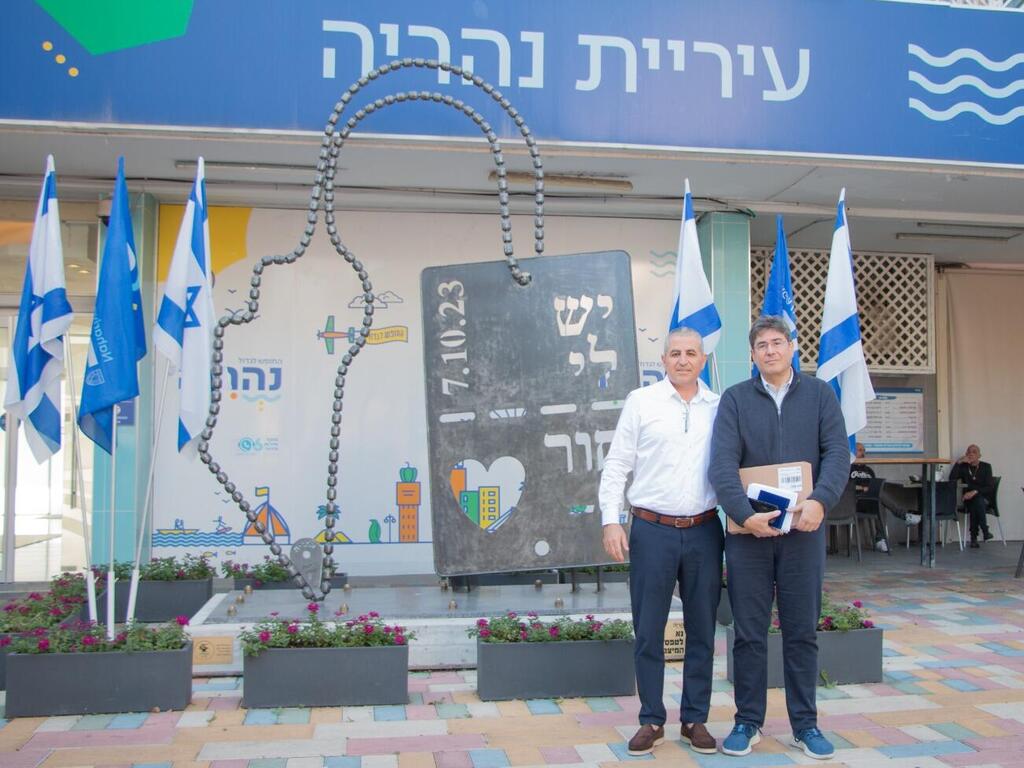 אריק גולדשטיין ורונן מרלי ראש עיריית נהריה.