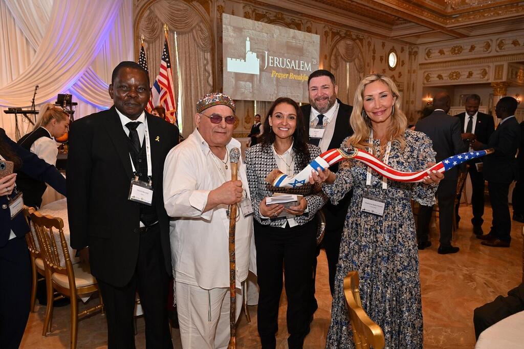 Okotch Mondoh, Robert Weinger, Sarah Boulos, Rory Kaye and Stephanie Bahn Poteet, with a red, white and blue shofar, at the Jerusalem Prayer Breakfast, Mar-a-Lago, Palm Beach, Florida, Jan. 14, 2025 (Photo: Jerusalem Prayer Breakfast) Okotch Mondoh, Robert Weinger, Sarah Boulos, Rory Kaye and Stephanie Bahn Poteet, with a red, white and blue shofar, at the Jerusalem Prayer Breakfast, Mar-a-Lago, Palm Beach, Florida, Jan. 14, 2025