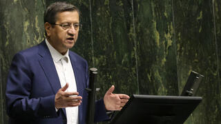 Iran's Finance Minister Abdolnaser Hemmati delivers a speech to members of parliament in Tehran on March 2, 2025, during impeachment proceedings against him 