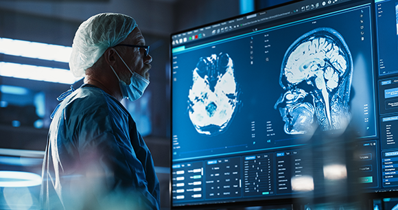 Scientists analyzing an fMRI image