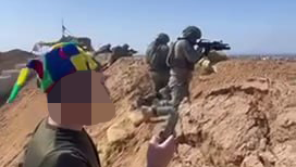 חיילי צה"ל יורים לכיוון רצועת עזה בזמן קריאת השם ״המן״ במגילה