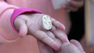 The seal in the hand of 3.5-year-old Ziv