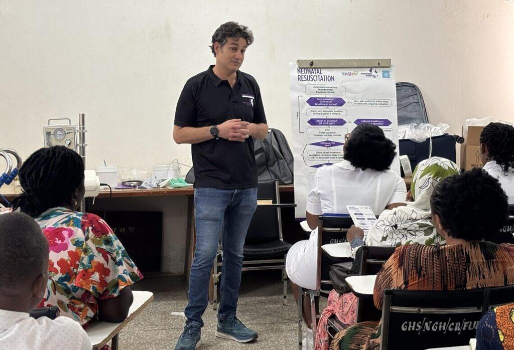 Dr. Meir Ezra Elia, founder of Neonatologists for Africa, provides a NRP course for about two dozen local staff at Nsawam Government Hospital (Photo: Maayan Hoffman/The Media Line) Dr. Meir Ezra Elia, founder of Neonatologists for Africa, provides a NRP course for about two dozen local staff at Nsawam Government Hospital