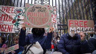 Students and others demonstrate during a protest outside the gates to the Columbia University on Monday 