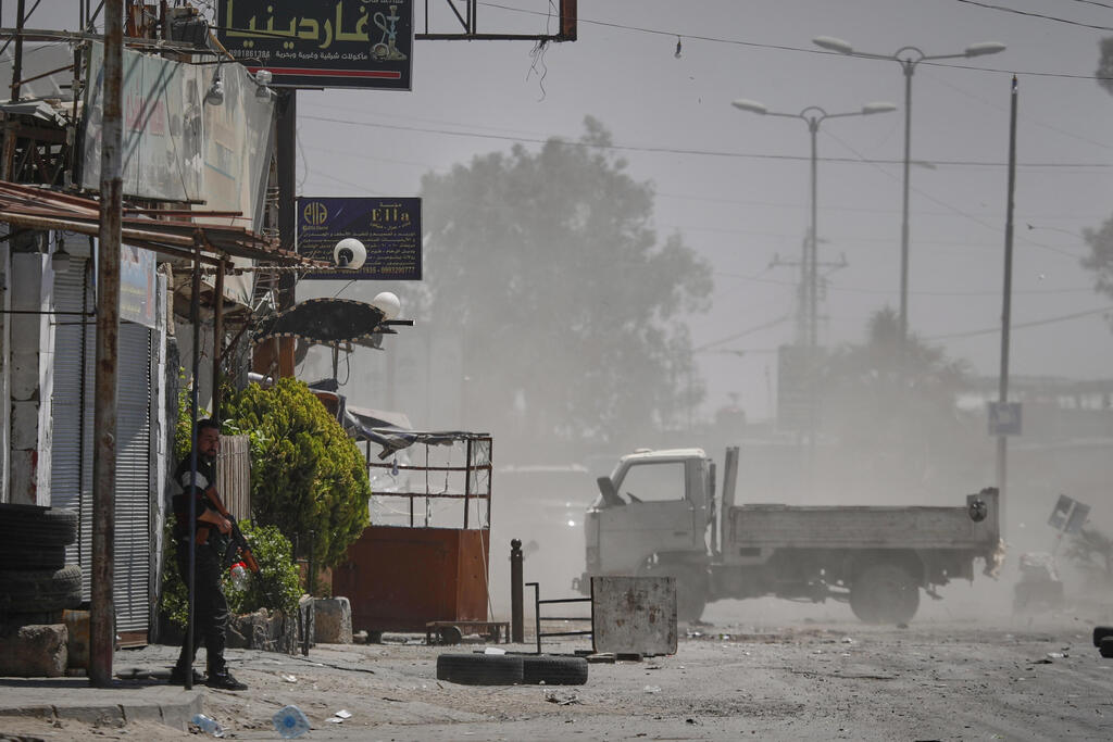 Clashes between Sunni Islamist groups and Druze in Syria 