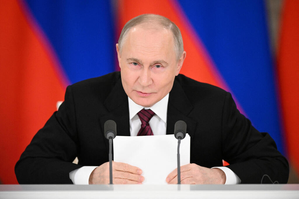 Russian President Vladimir Putin (Photo: Reuters/Sergey Bobylev/Host agency RIA Novosti) נשיא רוסיה ולדימיר פוטין ב מסיבת עיתונאים בקרמלין