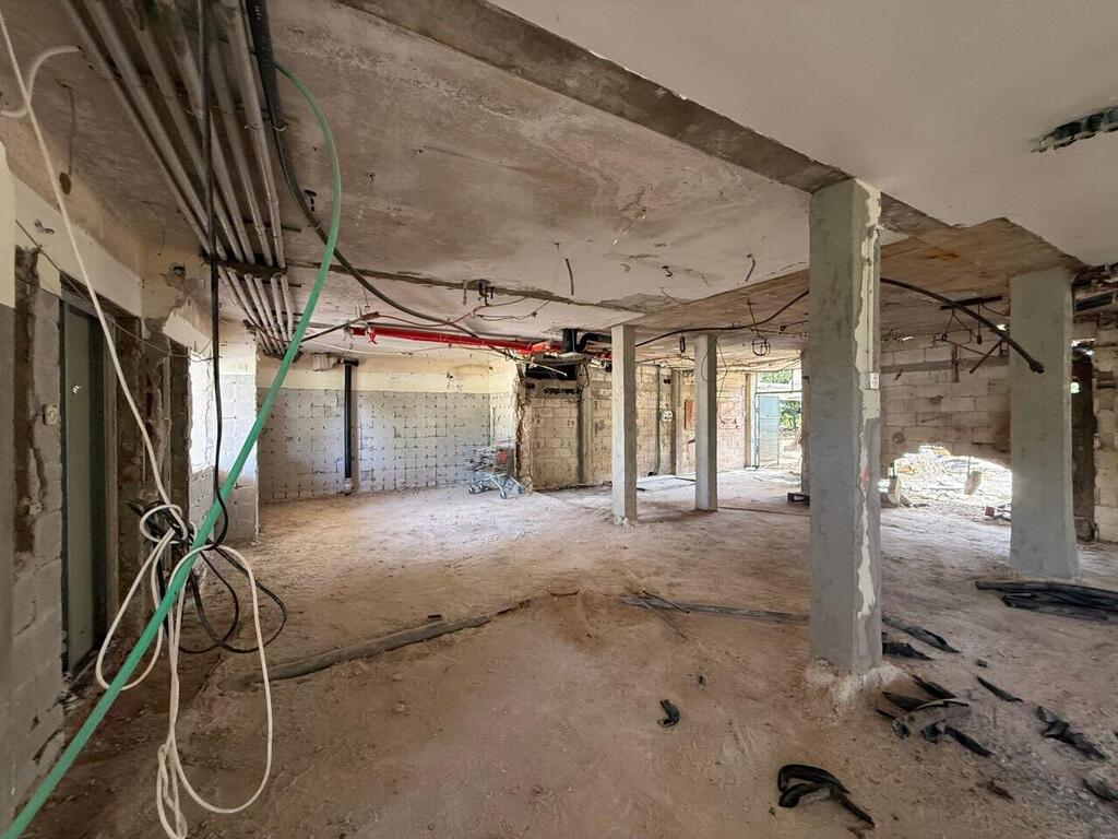 Rehabilitation work in the Gaza border town of Nahal Oz (Photo: Tekuma Rehabilitation Authority) שיפוץ הכלבו החדש בקיבוץ נחל עוז