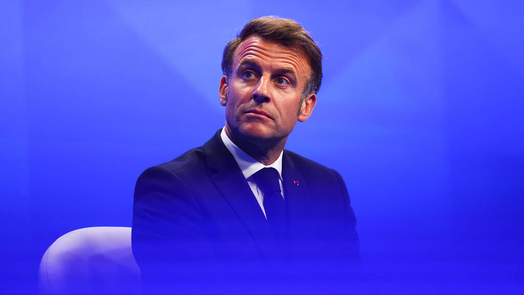 Эмманюэль Макрон (Фото: REUTERS/Edgar Su) נשיא צרפת עמנואל מקרון בביקור בסינגפור