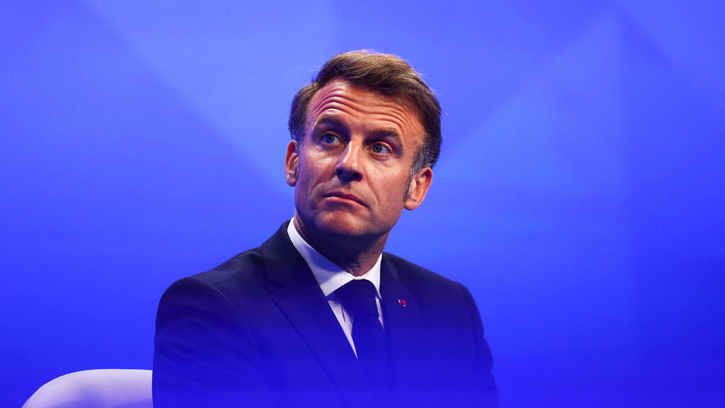 Эмманюэль Макрон (Фото: REUTERS/Edgar Su) נשיא צרפת עמנואל מקרון בביקור בסינגפור