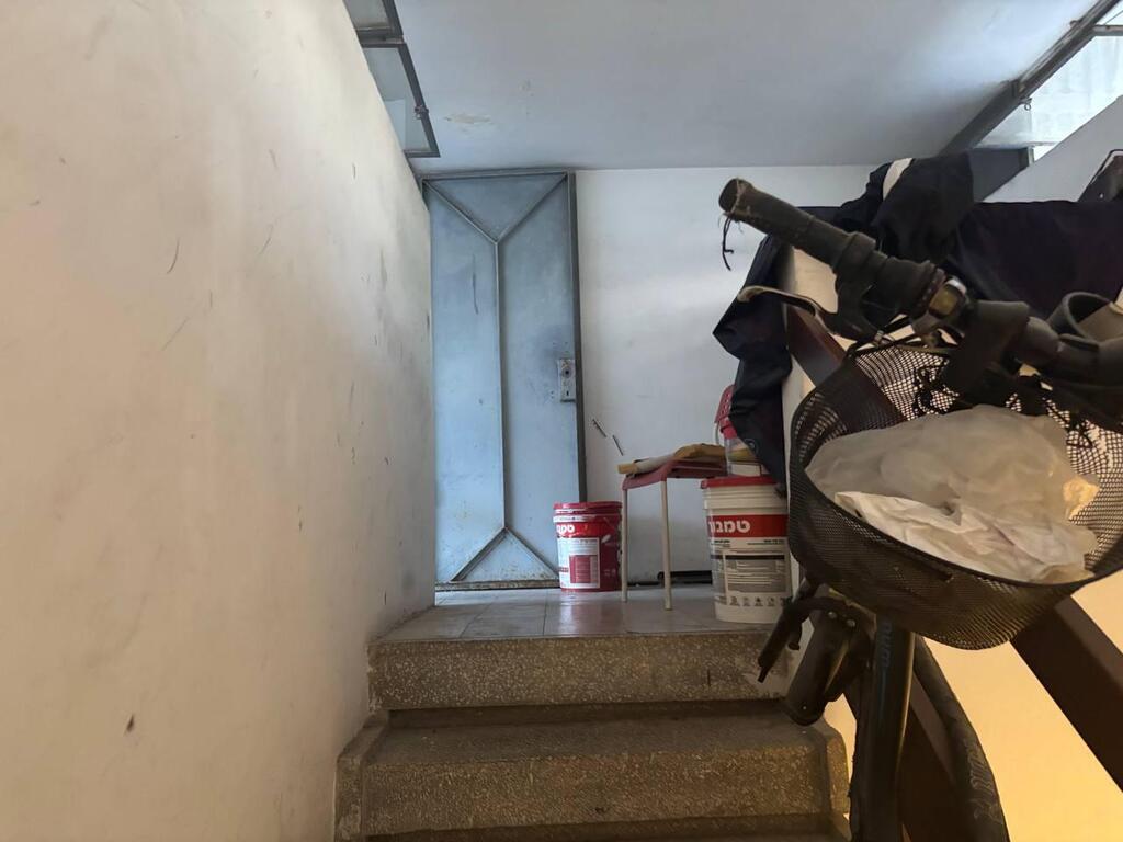 גג הבניין בבת ים בו התבצר הבעל לאחר שרצח את אשתו