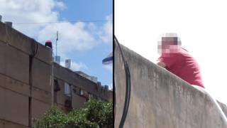 החשוד ברצח מאיים לקפוץ מגג הביניין