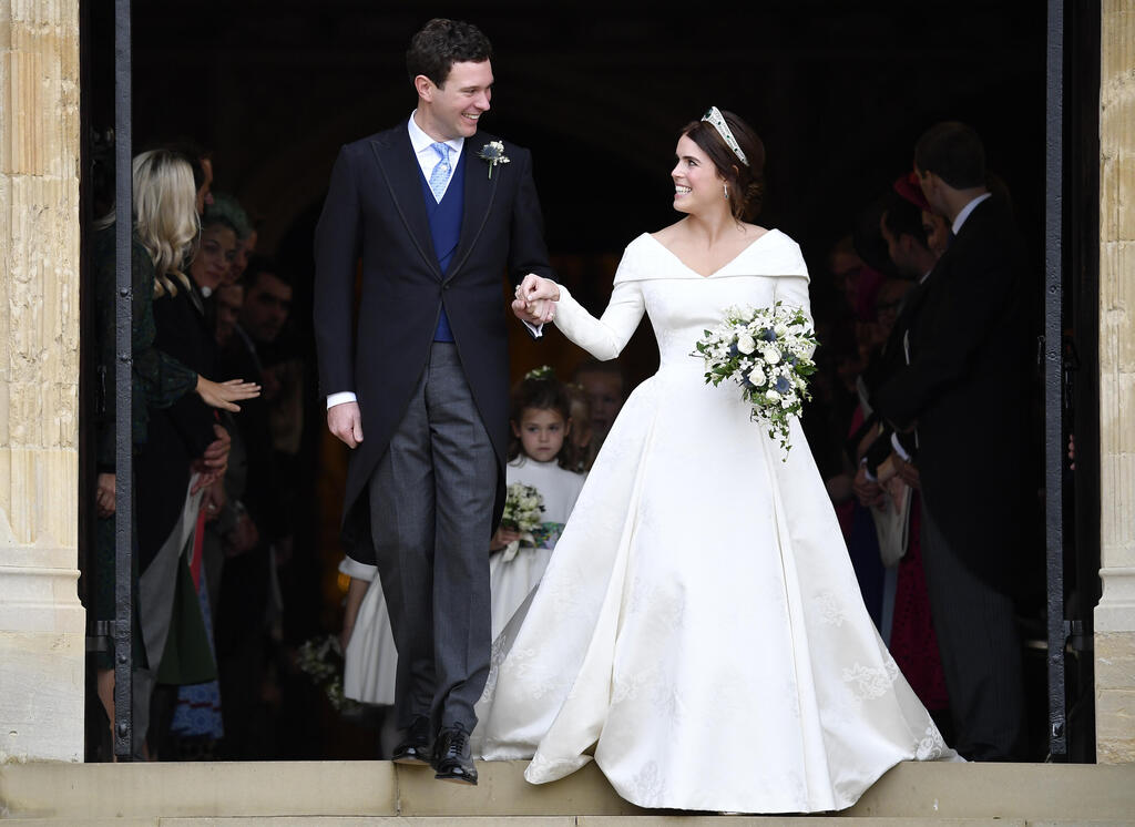 Princess Eugenie and Jack Brooksbank during their 2018 wedding (Photo: Toby Melville, Pool via AP) הנסיכה יוג'יני וג'ק ברוקסבק בחתונתם, 2018
