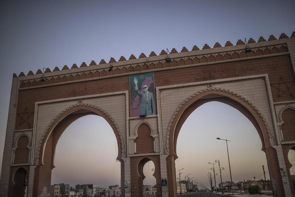 An archway in the entrance of Dakhla carries an image of Morocco's King Mohammed VI, in Western Sahara, Monday, Dec. 21, 2020 (Photo: AP Photo/Mosa'ab Elshamy) An archway in the entrance of Dakhla carries an image of Morocco's King Mohammed VI, in Western Sahara, Monday, Dec. 21, 2020