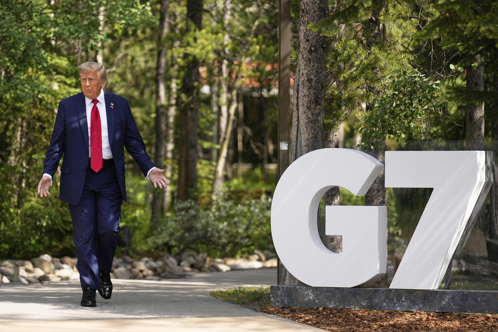 Trump at the G7 summit (Photo: AP Photo/Mark Schiefelbein) ועידת G7