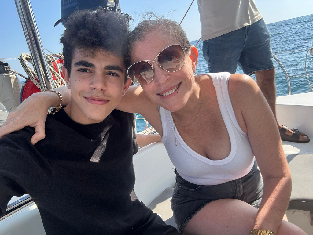 Dana and Gur Eden leave Israel on a small boat amid the conflict with Iran (Photo: Courtesy) דנה וגור עדן על הסירה