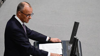 German Chancellor Friedrich Merz addresses delegates at the Bundestag (lower house of parliament) on June 24, 2025 in Berlin, prior on the upcoming NATO and EU summits.