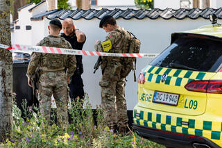 Danish Police stand at Norgesmindevej in Hellerup, Copenhagen, Denmark, adter responding to the Israeli embassy to investigate a suspicious package that was received at the embassy