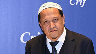 French writer and artist Marek Halter (L), Imam of the municipal Drancy mosque in Seine-Saint-Denis Hassen Chalghoumi attend the annual dinner of the Representative Council of Jewish Institutions of France (CRIF - Conseil Representatif des Institutions juives de France) at The Louvre Carrousel in Paris on July 3, 2025 