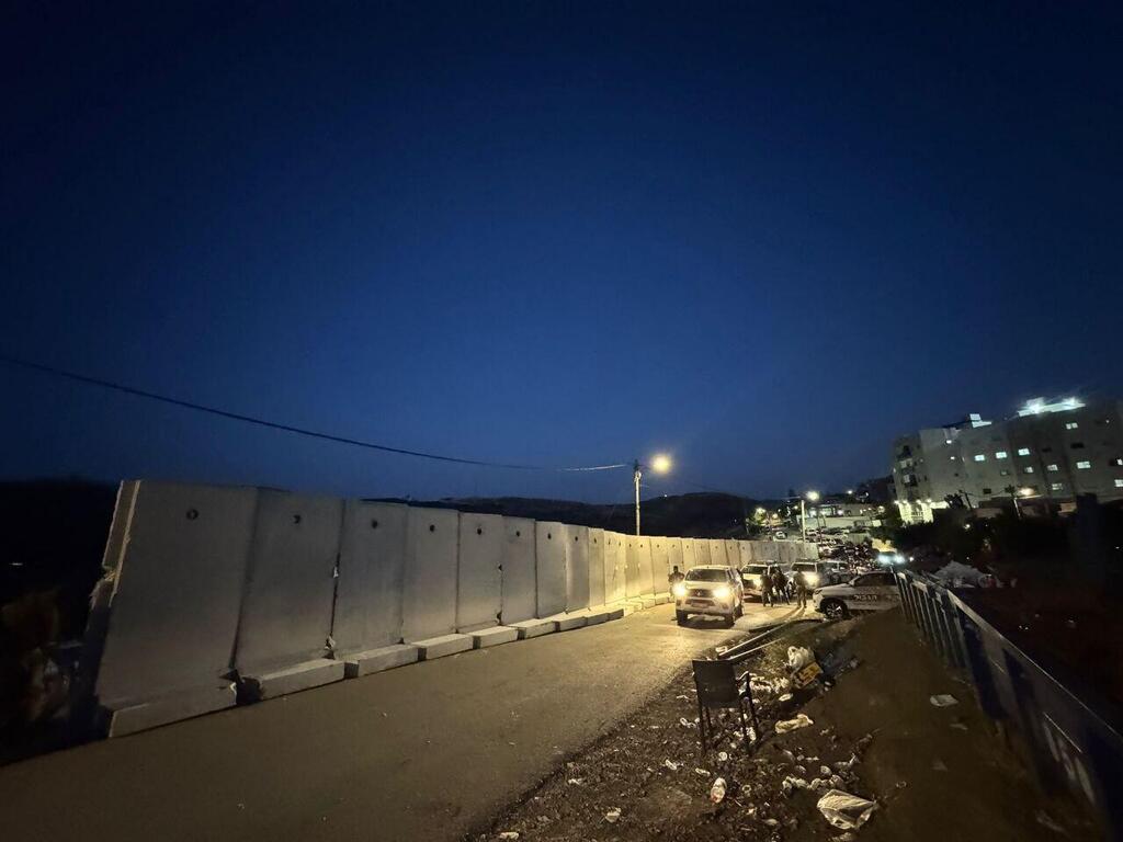 חומות שהוצבו בנקודת הגבול בין מג'דל שמס לחאדר