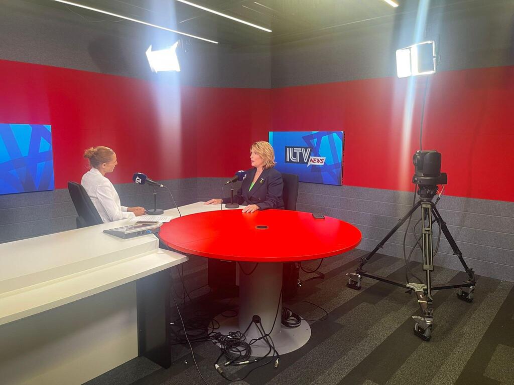 Laurie Cardoza-Moore records a podcast in the ILTV podcast studio