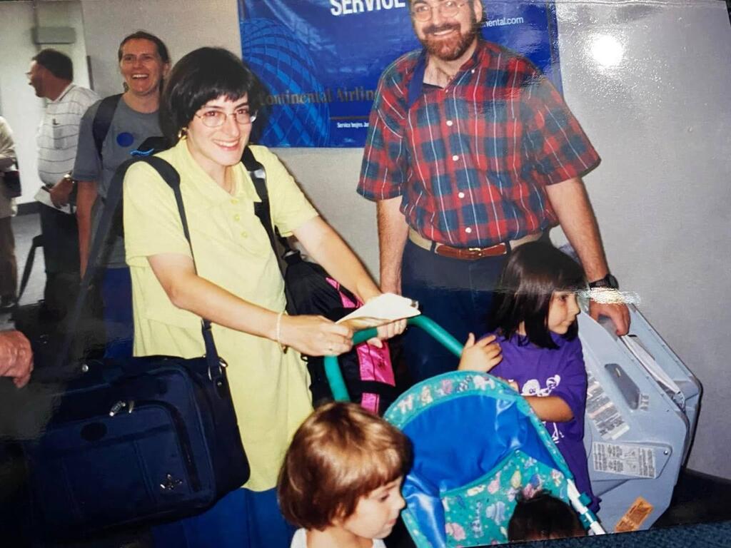 Marcy and Howie Oster and their small children make Aliya 