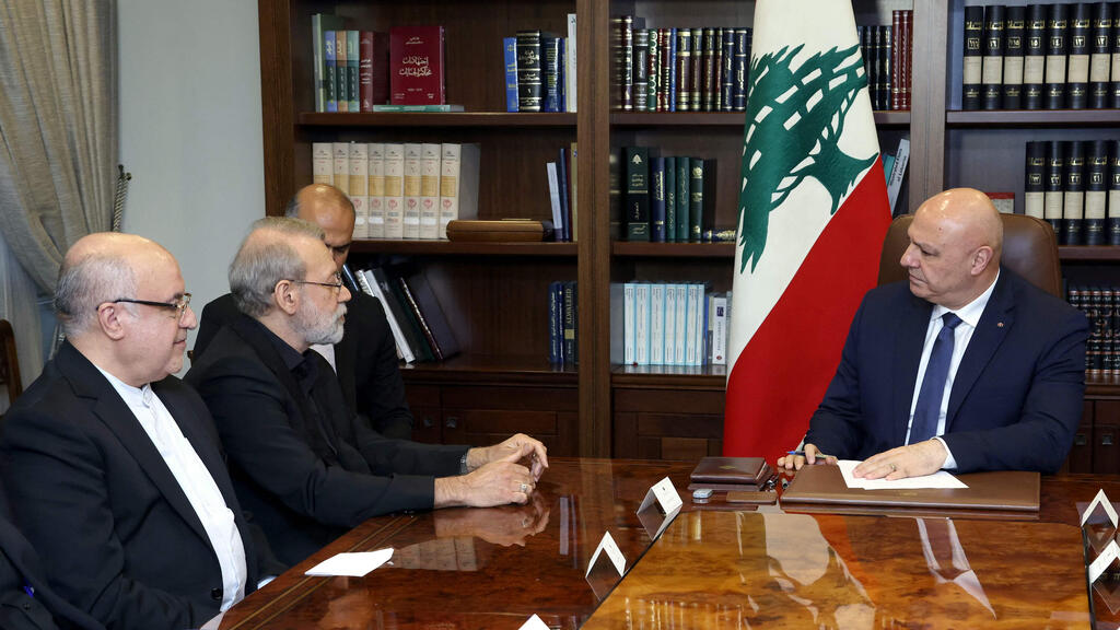 Lebanese President Joseph Aoun with visiting Iranian officials in Beirut on Wednesday (Photo: AFP ) ג'וזף עאון עם עלי לריג'אני