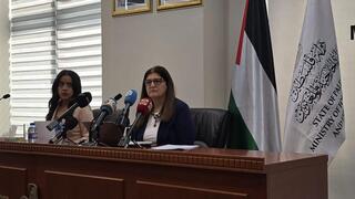 Palestinian Authority Minister of State for Foreign Affairs Dr. Varsen Aghabekian (R) and translator Israa Da’as (L) speak to the press at the Foreign Ministry in Ramallah, on the West Bank, Aug. 13, 2025 